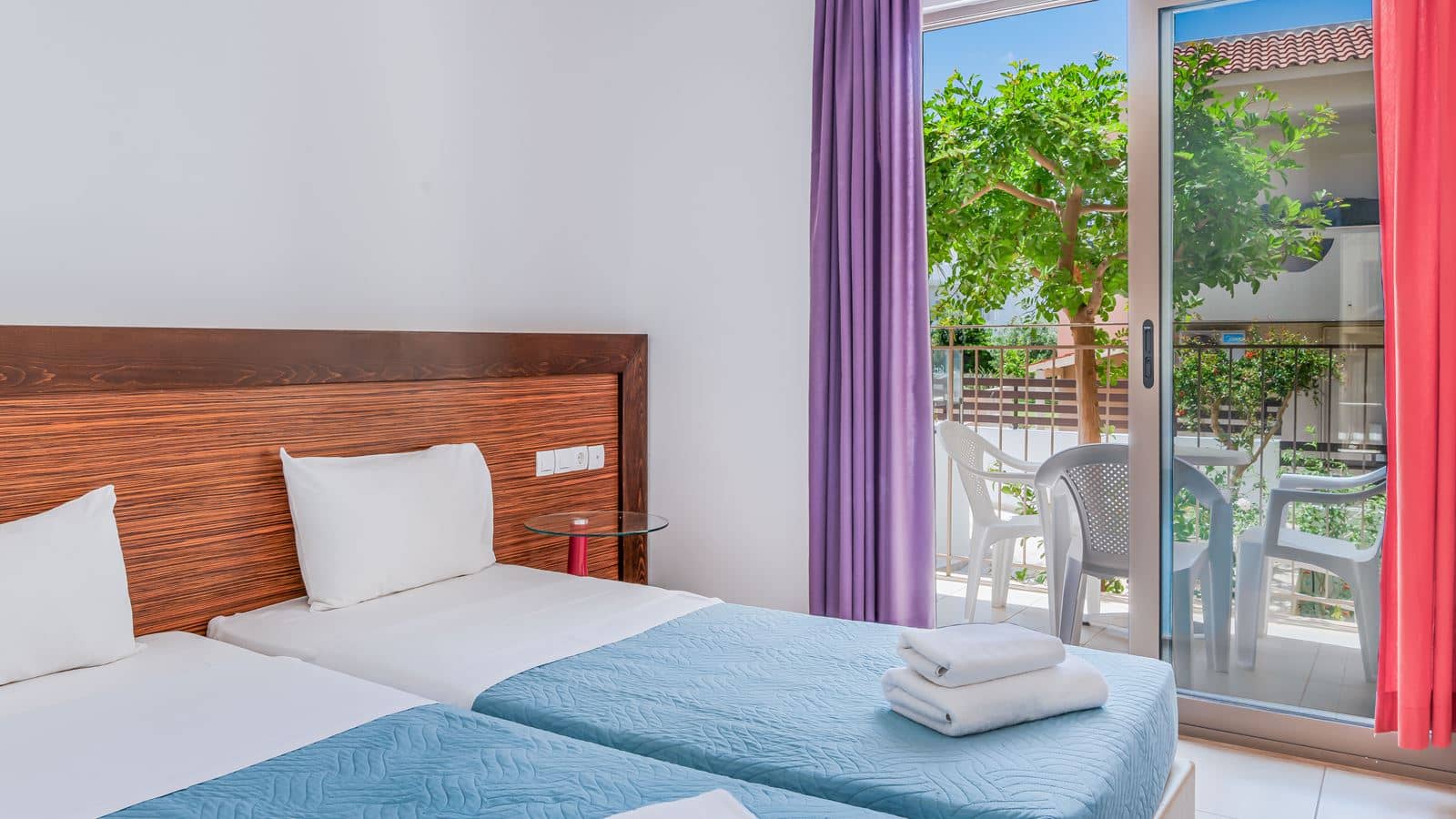 rooms-standard-1-bedroom-triple-apartment-balcony-or-terrace