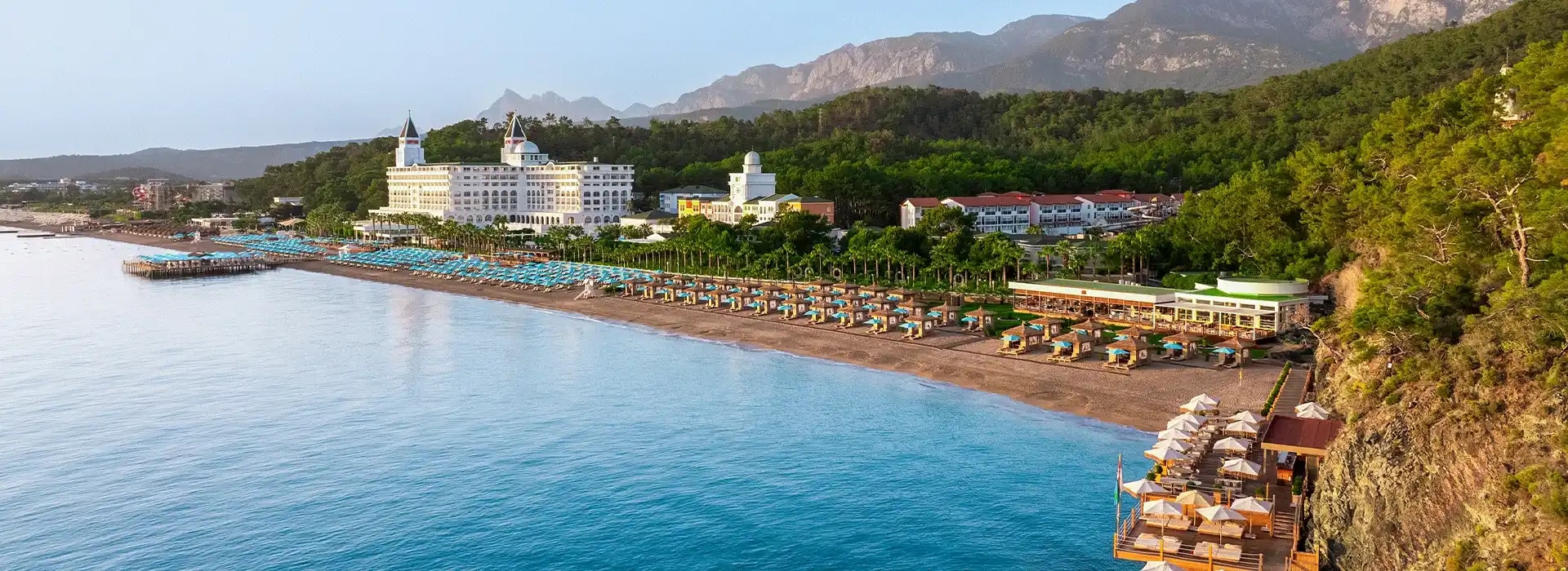 <div style="padding-left: 70px;"><img style="width: 100px; height: auto; margin: 25px 0;" src="https://b2ccdn.coraltravel.ee/content/Main Page Hotels Banners Destinations_Turkyie EE.svg" loading="lazy"></div>
<div style="padding-left: 70px; margin-bottom: 20px;"><img style="width: 200px; height: auto;" src="https://b2ccdn.coraltravel.lt/content/logos/hotel-logos/nirvana-logo-200.webp" loading="lazy"></div>
<div style="font-size: 28px; font-weight: 600; padding-left: 70px;">Nirvana hotels</div>