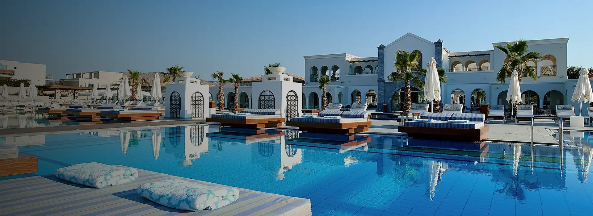 <div style="padding-left: 70px;"><img style="width: 100px; height: auto; margin: 25px 0;" src="https://b2ccdn.coraltravel.ee/content/Main Page Hotels Banners Destinations_Greece ee.svg" loading="lazy"></div>
<div style="padding-left: 70px; margin-bottom: 20px;"><img style="width: 200px; height: auto;" src="https://b2ccdn.coraltravel.lt/content/logos/hotel-logos/anemos-w200px copy.webp" loading="lazy"></div>
<div style="font-size: 28px; font-weight: 600; padding-left: 70px;">ANEMOS LUXURY GRAND RESORT</div>