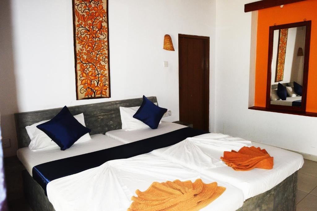 rooms-standard-double-room-with-fan