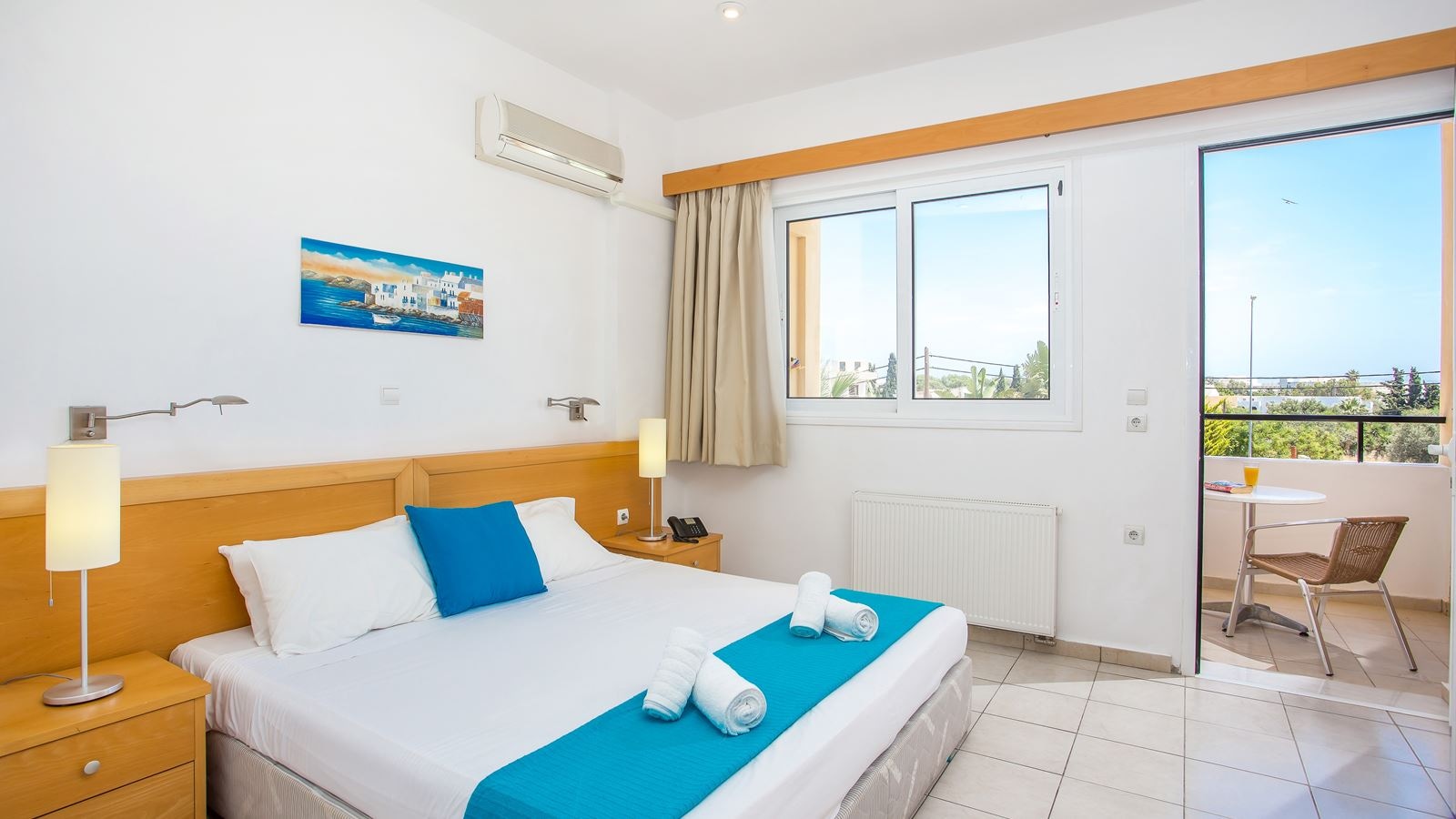 rooms-double-room-poolroad-view-with-balcony