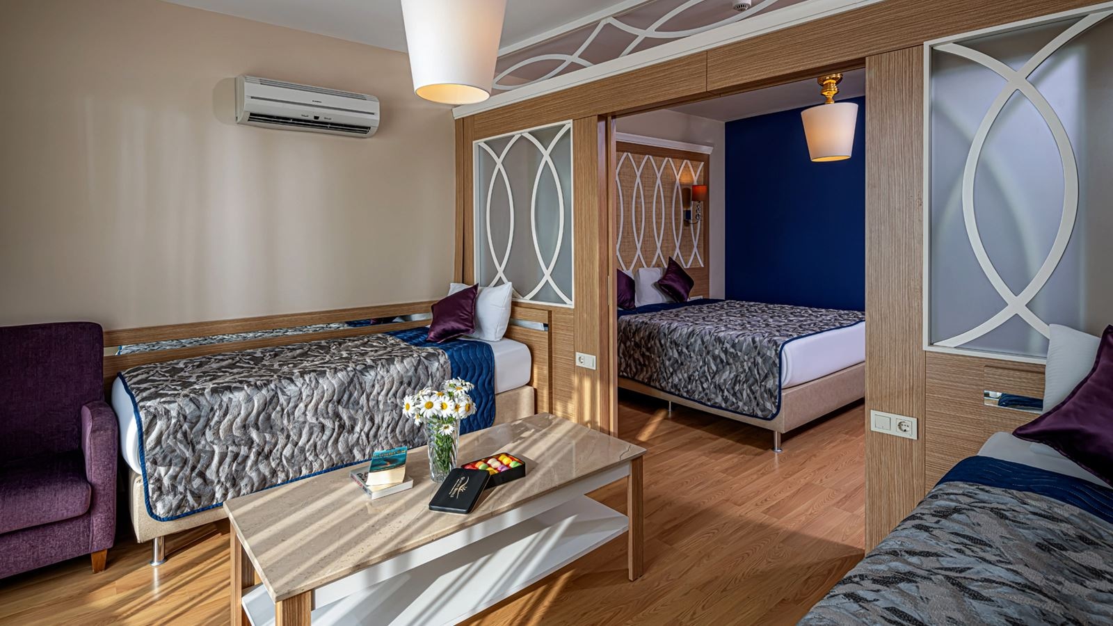 rooms-main-building-family-2-bedrooms-with-sliding-doors-pool-view-couple--ladies-only